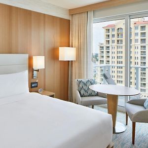 Guest room king bed coast view balcony